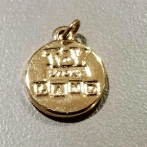 Toy Story Land Pendant Charm Gold Tone Poof Sticky